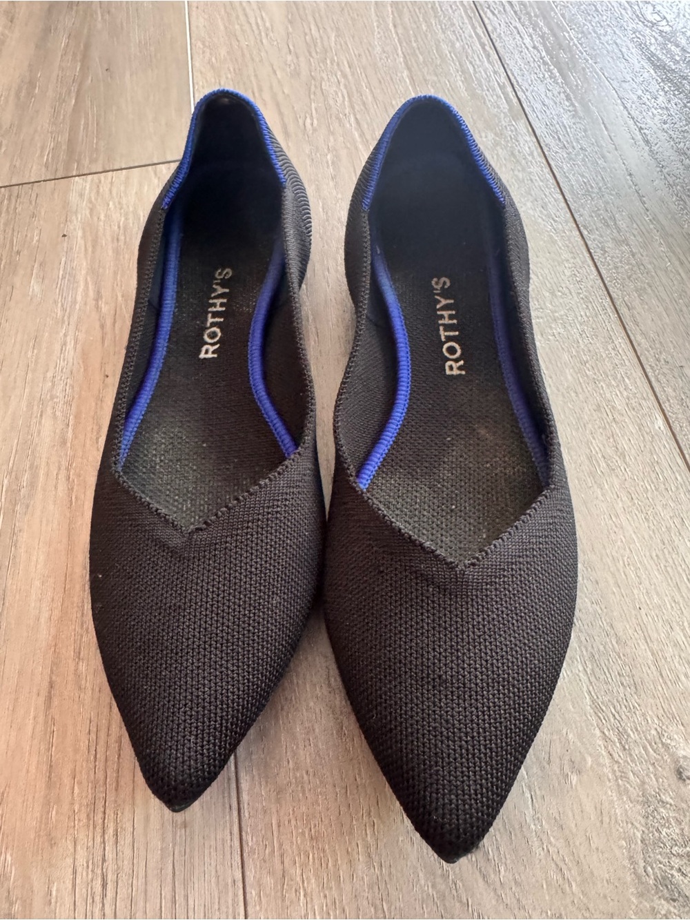 Rothy's Black Pointed Flats with Blue Trim